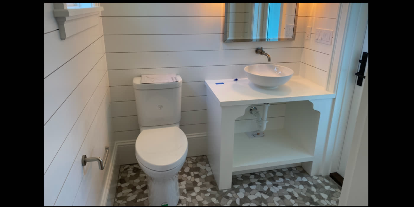 Completed bathroom plumbing project